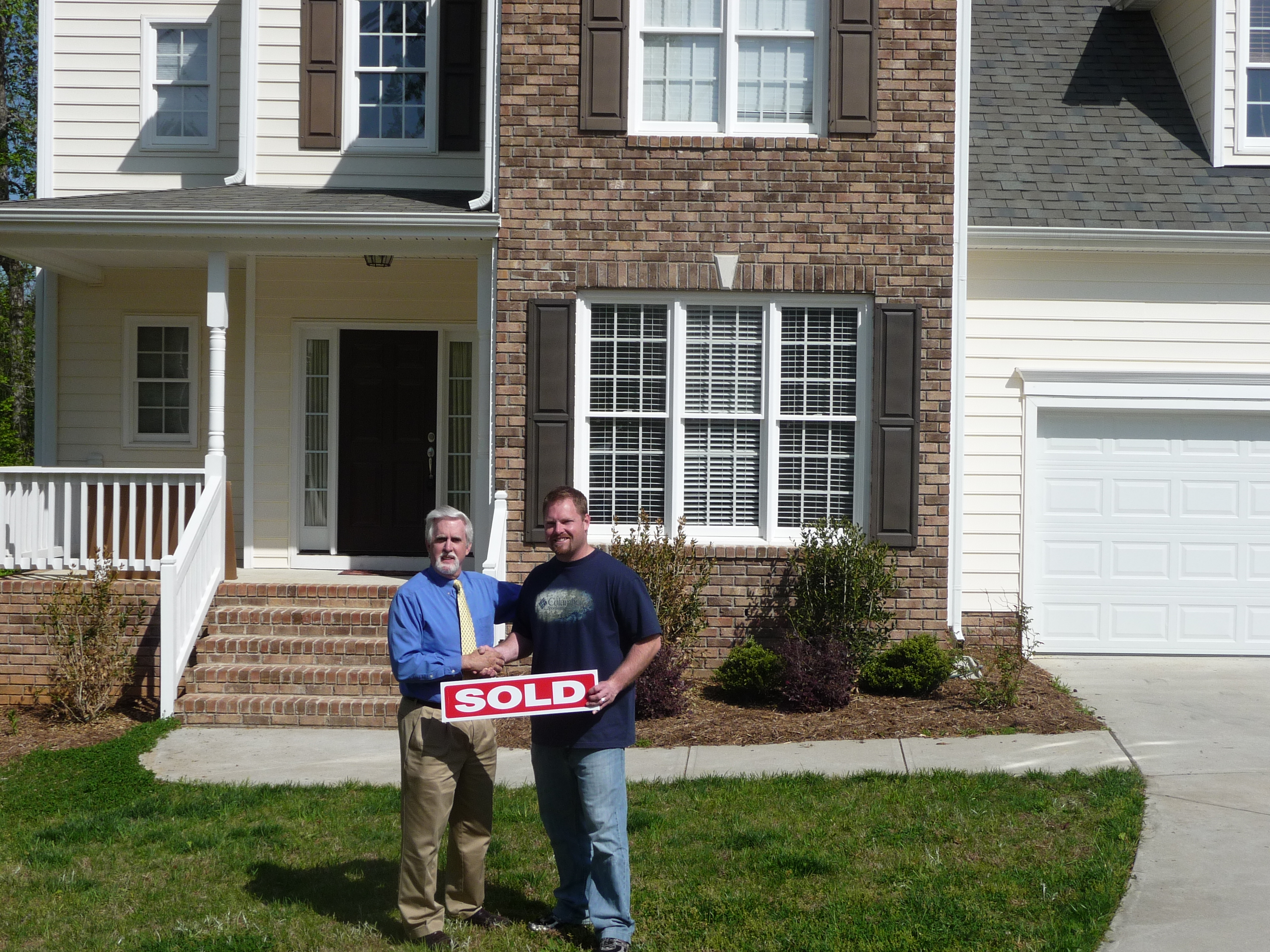 Corey Fobes In Front of His House That Sold in 30 Days