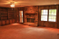 Huge family room with built in bookcases and masonary fireplace no image
